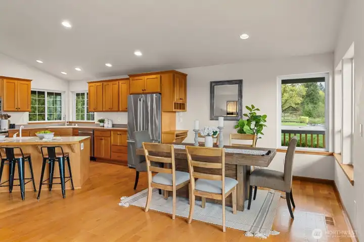 Dining area is perfectly located next to the kitchen and has views off the deck.
