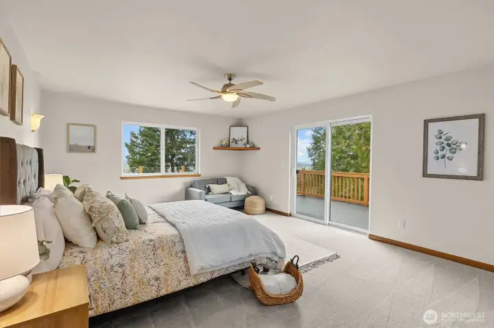 primary bedroom has slider access to deck.