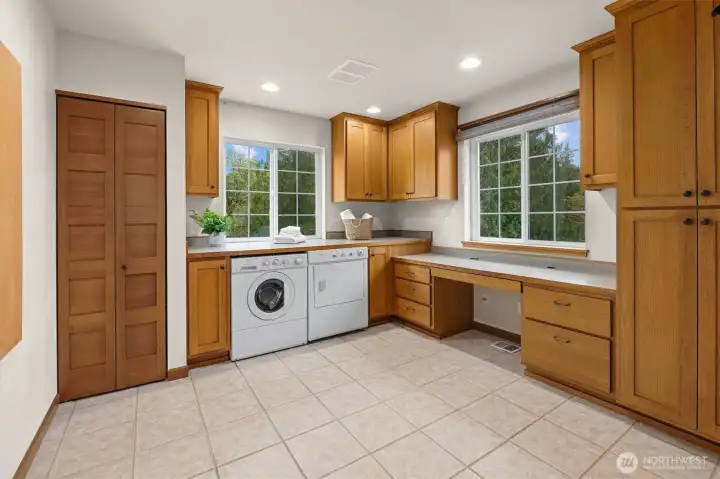 Huge laundry room can be used as office or craft room.