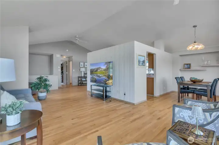 View from the front of the home towards the dining room, kitchen and open Great room areas.