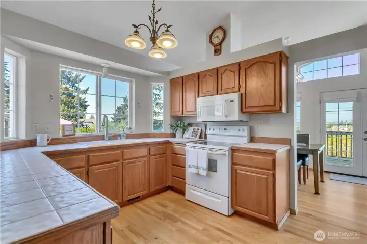 Lovely oak kitchen with beautiful ceramic tile countertops!