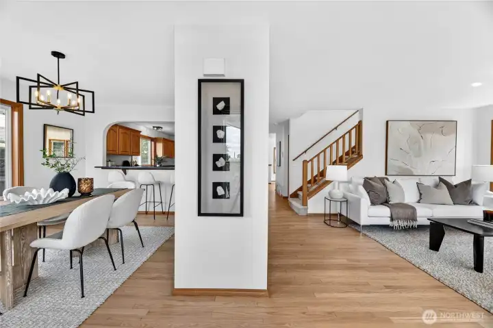 Light-filled living and dining spaces with warm hardwoods, crisp modern styling, and an open flow ideal for everyday living and entertaining.