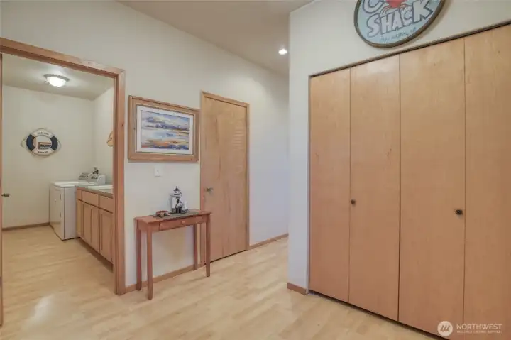 Downstairs, the main entry has abundant closet space and the laundry room is near the stairs.