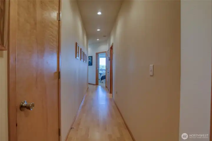 Moving down the hallway, we will find the bedrooms, bonus room and bathroom.