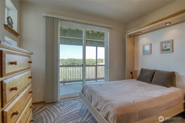 This room has a beautifully constructed murphy bed, so can be used for sleeping space or....