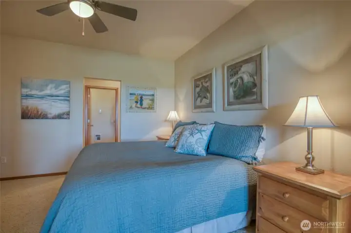 Stepping back inside, the primary suite is just off of the bonus room.