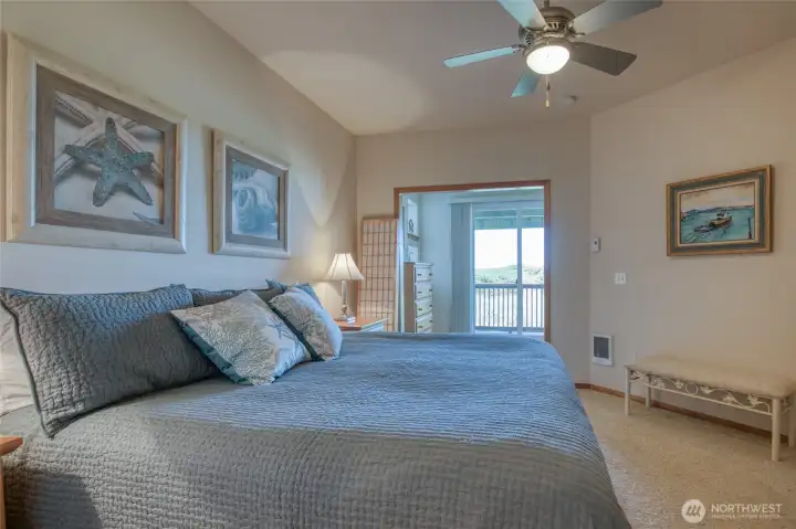 The spacious sweet looks out to the west through the bonus room, and features a ceiling fan to keep that ocean air circulating at night.