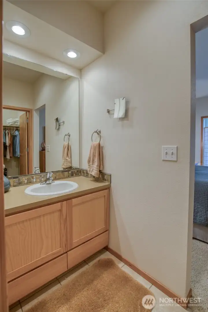 The primary suite features an ensuite bath and large, walk in closet.