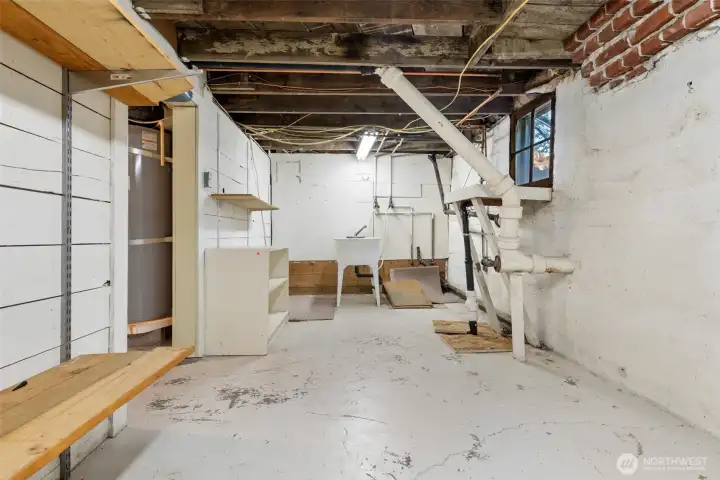 Basement Room with Sink and Sump Pump