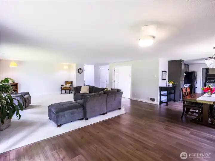 Living room, kitchen and office to the right