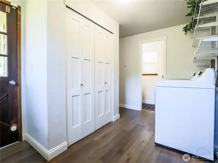 Laundry with 1/4 bath, and side door