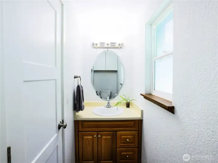 1/4 Bath sink off kitchen and laundry