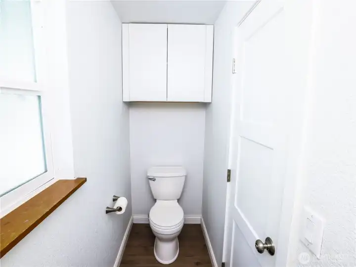 1/4 Bath toilet off kitchen and laundry