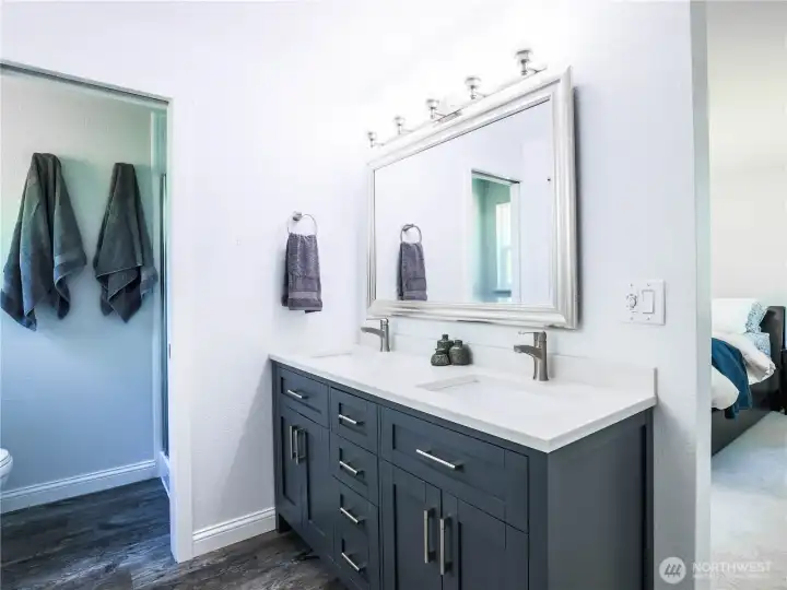 Master bathroom   shower and toilet on left