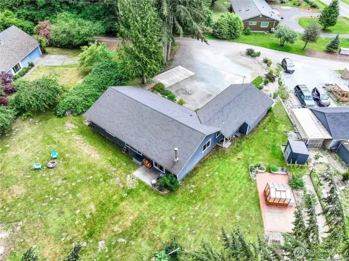 Aerial view back looking forward to driveway