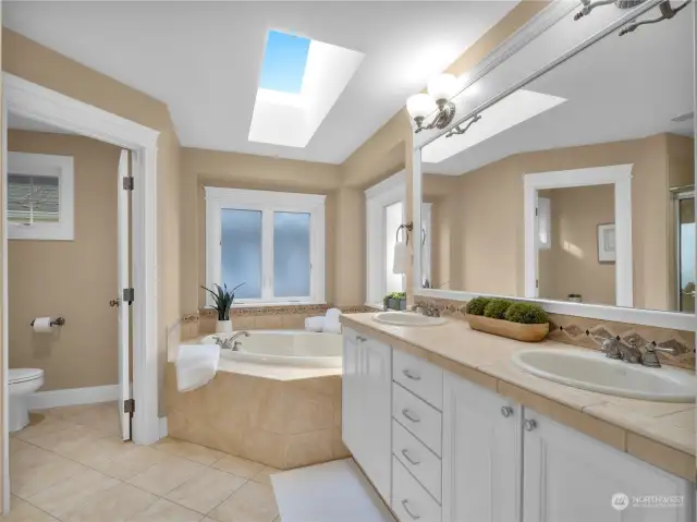 Create your own spa retreat in this luxurious 5-pc bathroom, with soaking tub and privacy window.