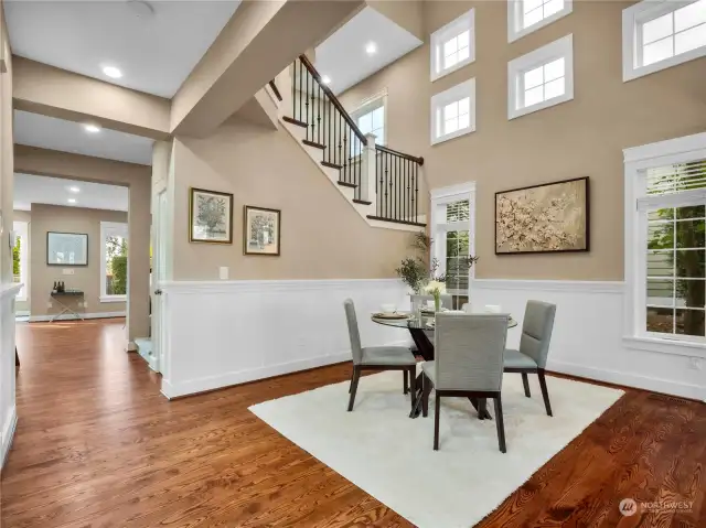 This stunning home offers the perfect blend of modern design and timeless elegance...vaulted ceilings, extensive hardwood flooring, white doors & millwork throughout.