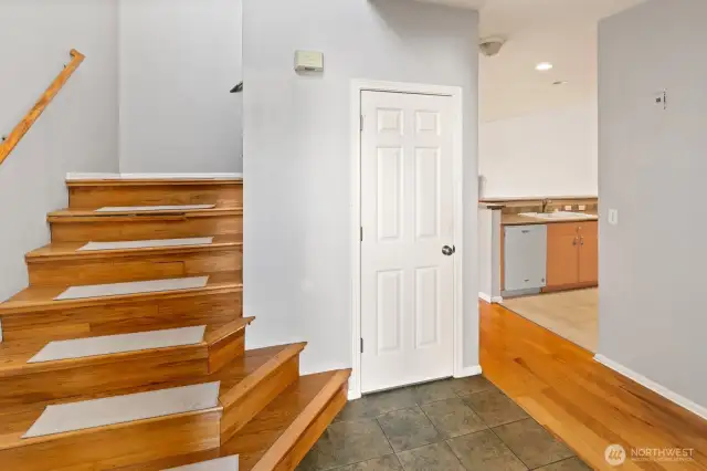 Staircases to upper bedrooms and living area to your right as you enter.