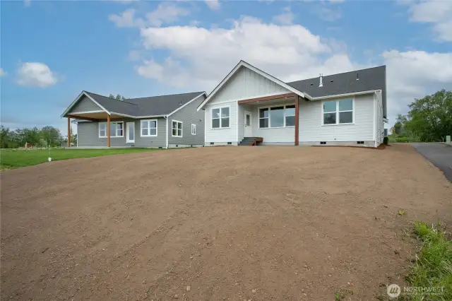Backyard with a walking trail.