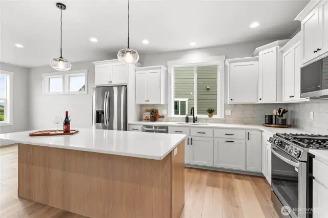 Large island with storage will be great for serving guests.