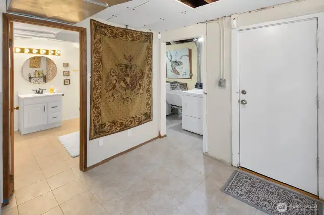 So much space downstairs, complete with storage, utility room, and a door leading outside. Potential for an ADU or multi-generational living.