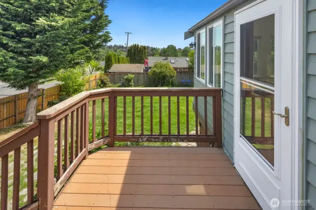 There is a back deck on either side of the sunroom.