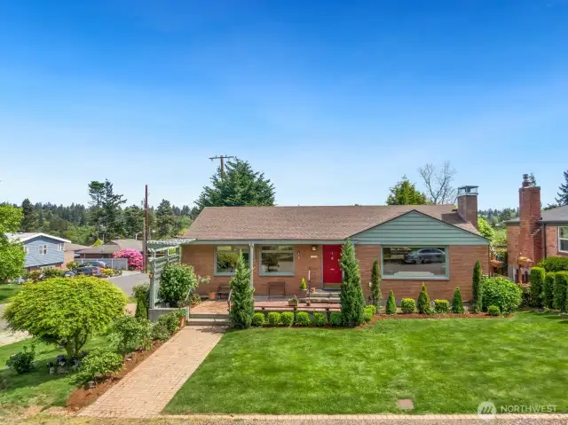 This Crown Hill home is well-cared for, in great shape, and it's ready for your personal touch. You could build up to catch a view of the Olympics, create an ADU, or DADU. What possibilities come to mind?