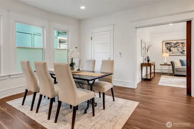 The large bright dining room makes dinner or game nights a joy!
