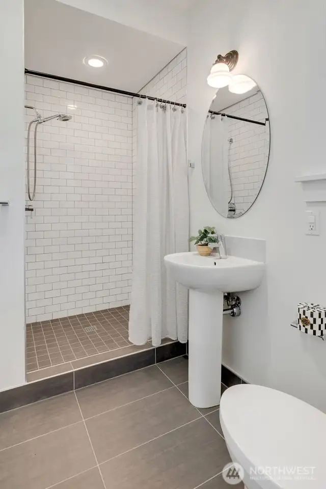 This is the 3/4 bath on the main off the butlers pantry and bedroom/office.