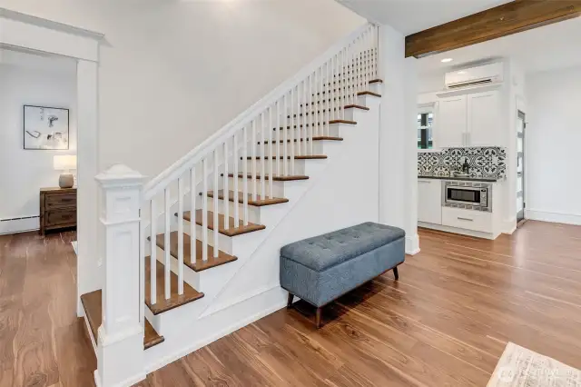 The grand stairs invite you up.