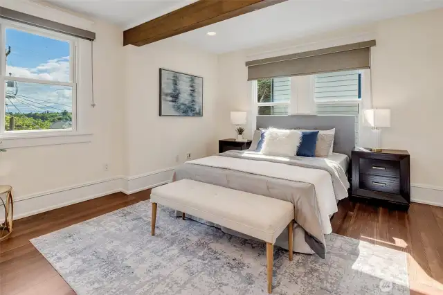 The large primary suite boasts Southern views, a large closet and ensuite bath.