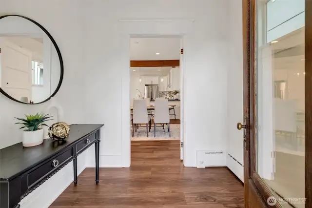 Upon entering find yourself in a fabulous foyer with room to hang and coats and kick of your shoes.
