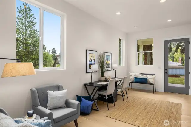 We have seen homeowners use this room as a office, gym, playroom, lounge, art space. Consider adding in a glass wall patrician to really separate the space.