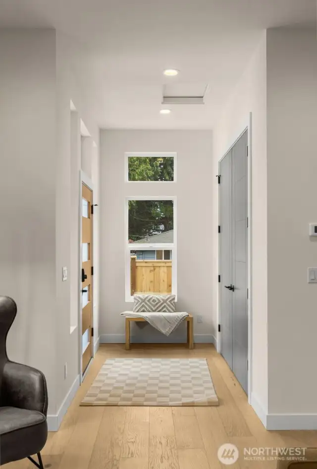 Front entry. Do you know why TrendHomes build mega size front closets? Fun fact each Seattleite has a average of 19 jackets.