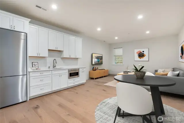 Main floor "Mother in law" or rec room + 2nd laundry (digitally staged)