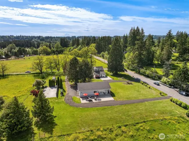 1 acre of living space and 4 acres of fenced pastures
