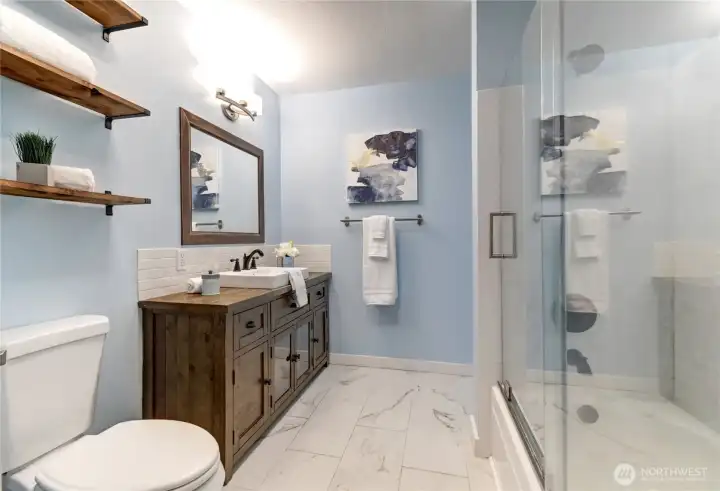 Updated bath with rustic vanity