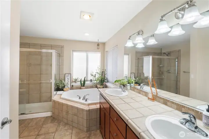 5 Piece Primary Bath with corner soaking tub & shower with tile surround!