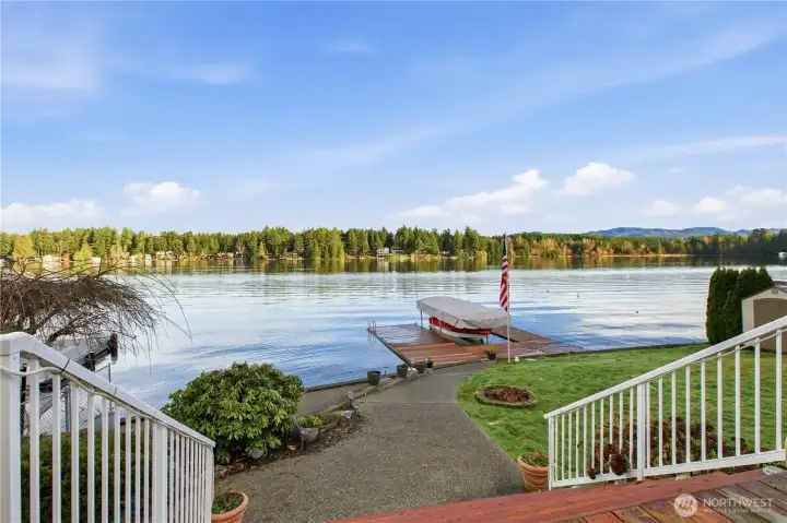 Spacious staircase providing deck access to the water