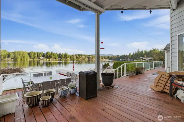 Spacious deck overlooking the water, ideal for entertainment