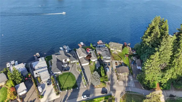 Boating on lake Sawyer with overhead view of home.