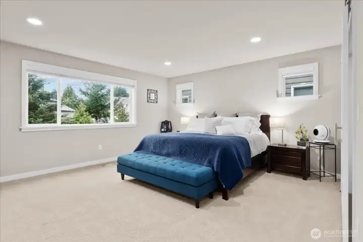 The primary bedroom is a true oasis large and enough for all your furniture. With two walk-in closets, double door entry and an en-suite bathroom - this space has all the room you need to relax and unwind after a long day.