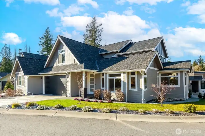 9077 Sea Smoke Lane is on a corner lot with nice landscaping already done - fully maintained by the HOA so you don't have to do any yard work!