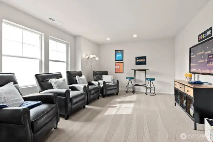 Large bonus room perfect for a media space, game room, or playroom. Photo is representational. Actual home is under construction. Colors, materials, and features may vary. See site agent for details.