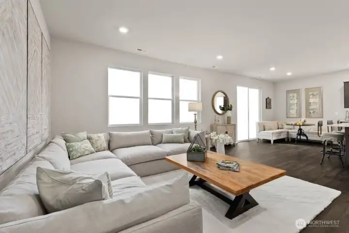 Very large open concept great room to host get togethers with ease. Photo is representational. Actual home is under construction. Colors, materials, and features may vary. See site agent for details.