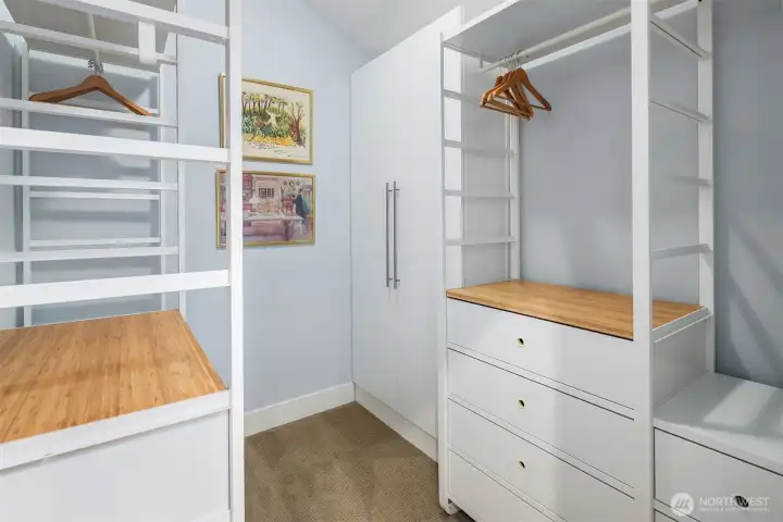 Spacious primary walk-in closet!