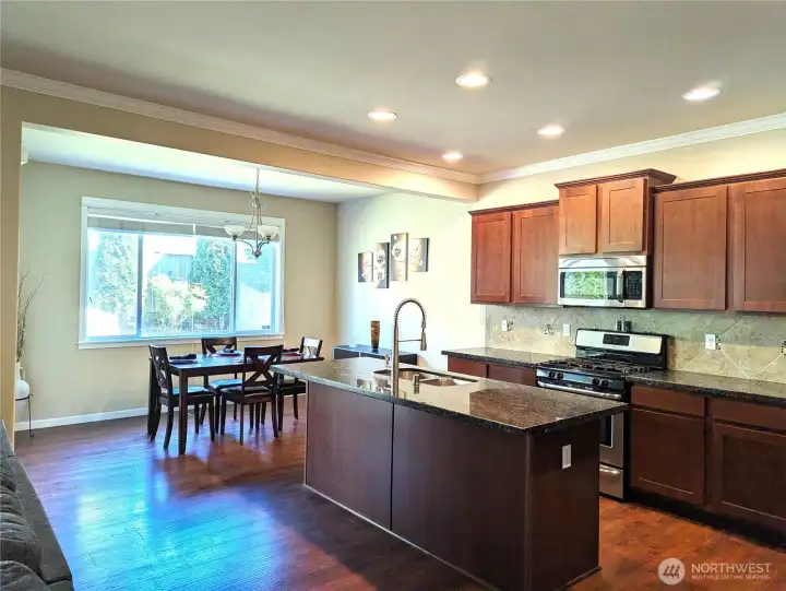 Huge island with breakfast bar area.