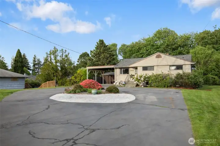 Huge circular driveway lends ample parking for you and your guests.