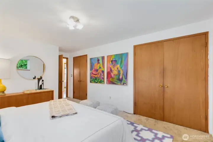 2 closets and space for dresser and nightstands.