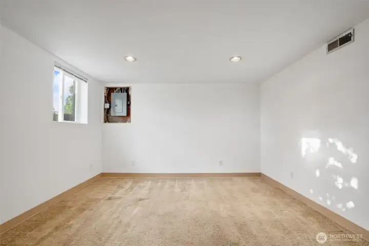 Basement finished space.  Bedroom, home gym, home office, MIL potential?